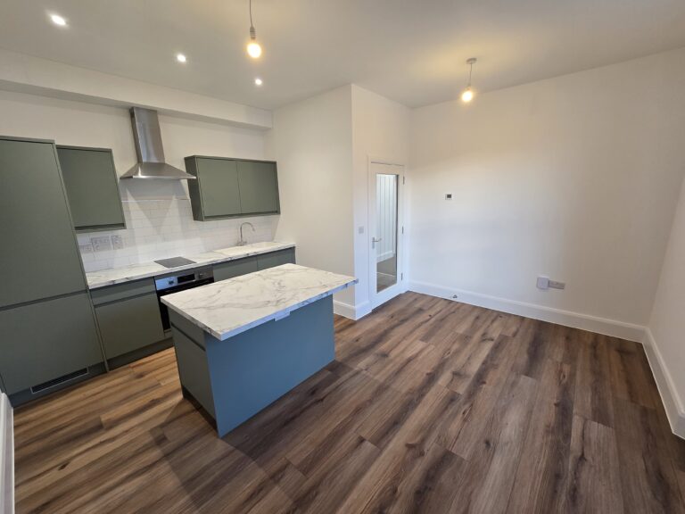 Completed kitchen and living area in YMCA assisted living accommodation