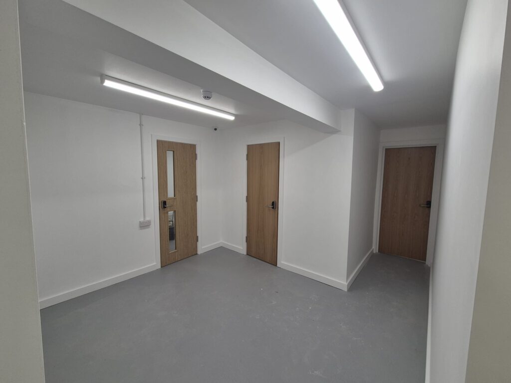 Finished communal hallway at YMCA assisted living flats in Paignton